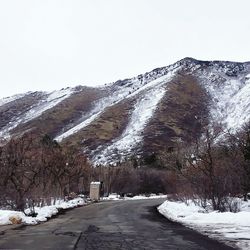 Snow covered mountain against clear sky