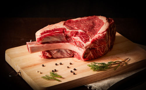 Close-up of meat on cutting board