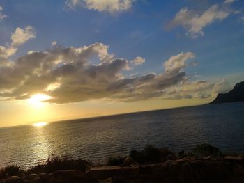 Scenic view of sea against sky during sunset