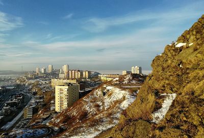 High angle view of buildings against sky