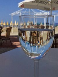 Close-up of beer glass on table