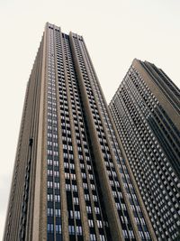 Low angle view of modern buildings against clear sky