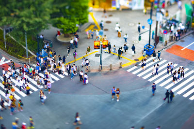 High angle view of people walking on street