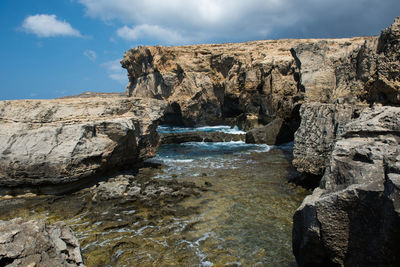 Scenic view of rock formation against sky