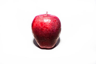 Close-up of apple against white background