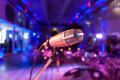 Close-up of microphone at nightclub