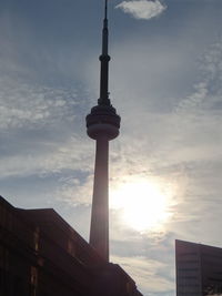 Low angle view of tower at sunset