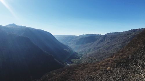 Scenic view of mountains against clear sky