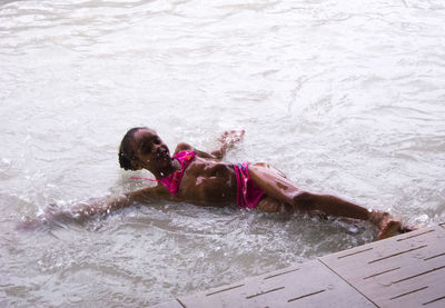 Boy playing in water