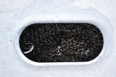 Fishing net seen from white boat