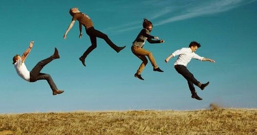 mid-air, jumping, flying, full length, leisure activity, lifestyles, enjoyment, fun, sport, freedom, blue, motion, carefree, low angle view, men, vitality, clear sky, togetherness