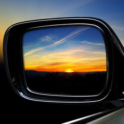 Reflection of clouds in glass train