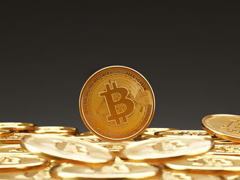 Close-up of coins on black background