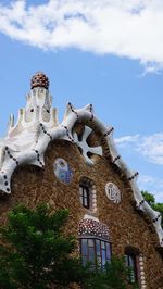 Low angle view of a statue against building