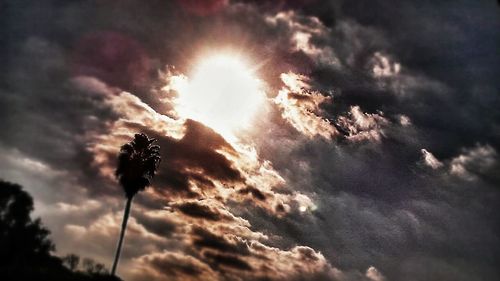 Low angle view of cloudy sky at sunset