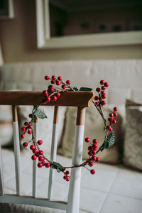 Close-up of red flowers on table