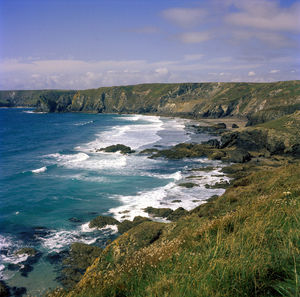 Scenic view of sea against sky at kynance cove in cornwall