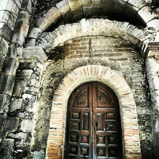 arch, architecture, built structure, building exterior, old, history, stone wall, low angle view, archway, brick wall, entrance, indoors, arched, steps, day, no people, building, old ruin, the past, window