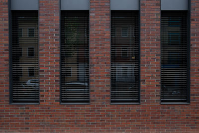 Low angle view of brick wall in building