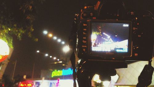 Low angle view of illuminated building at night