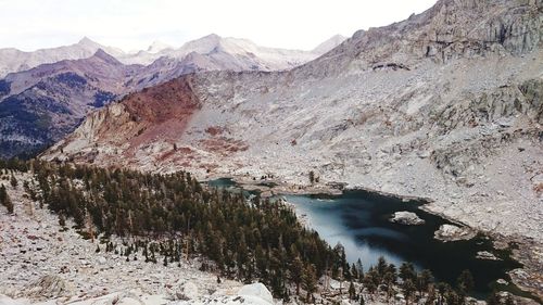 Scenic view of lake and mountains during winter