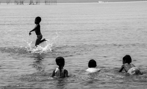 People enjoying in swimming pool