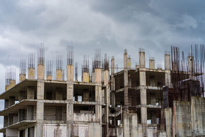 Low angle view of buildings against sky in city