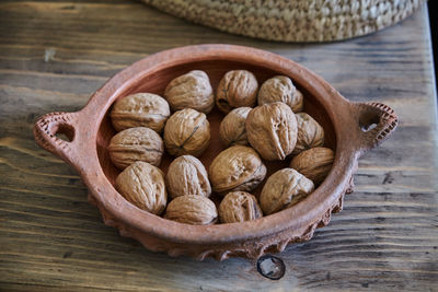 High angle view of eggs in basket on table