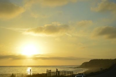 Scenic view of sea at sunset