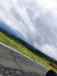 Scenic view of mountain road against sky