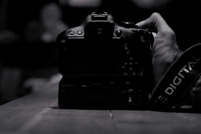 Close-up of camera on table