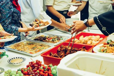 High angle view of people on table