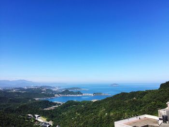 View of city against blue sky