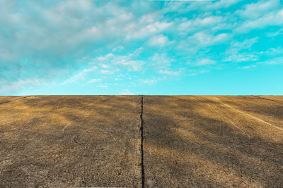 Scenic view of wall against sky