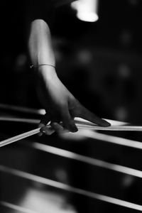 Close-up of hands playing piano