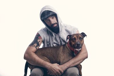 Portrait of a young man with dog