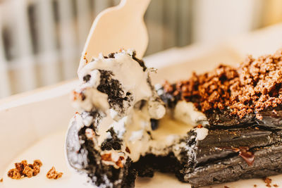 Close-up of cake served on table