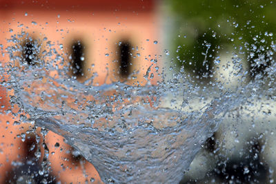 Full frame shot of raindrops on glass window