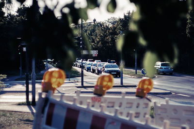 Tilt-shift image of cars on street in city