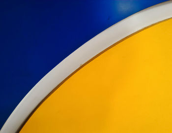 Close-up of yellow and blue wall design