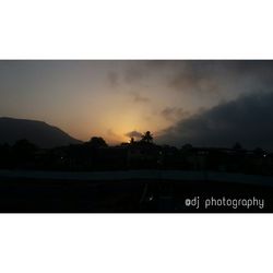 Close-up of silhouette mountain against sky during sunset