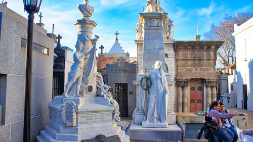 Statue of historic building against sky