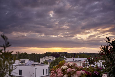 High angle view of townscape against sky at sunset