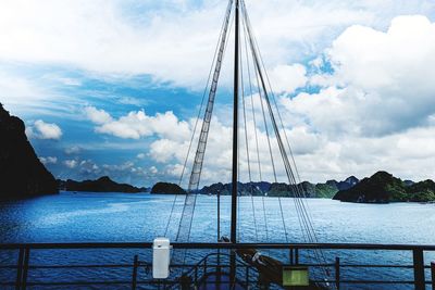 Sailboat on sea against sky