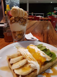 Close-up of food served on table