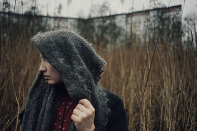 Midsection of woman wearing warm clothing