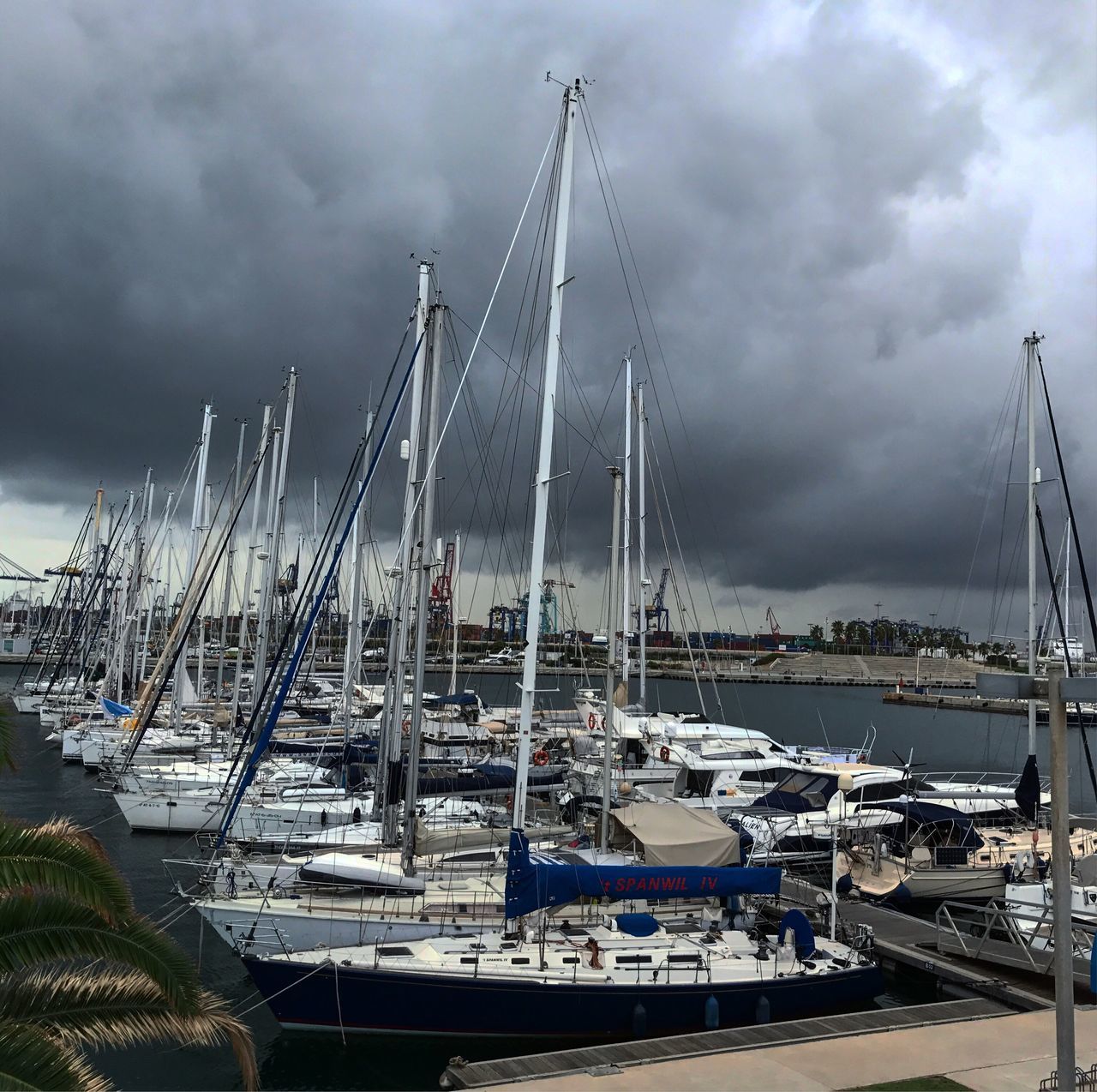 nautical vessel, moored, transportation, cloud - sky, mode of transport, harbor, mast, sky, no people, water, outdoors, sailboat, day, sea, nature, yacht, storm cloud