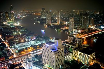 High angle view of illuminated cityscape at night