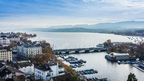 High angle view of river amidst buildings in city