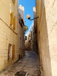 Narrow alley along buildings